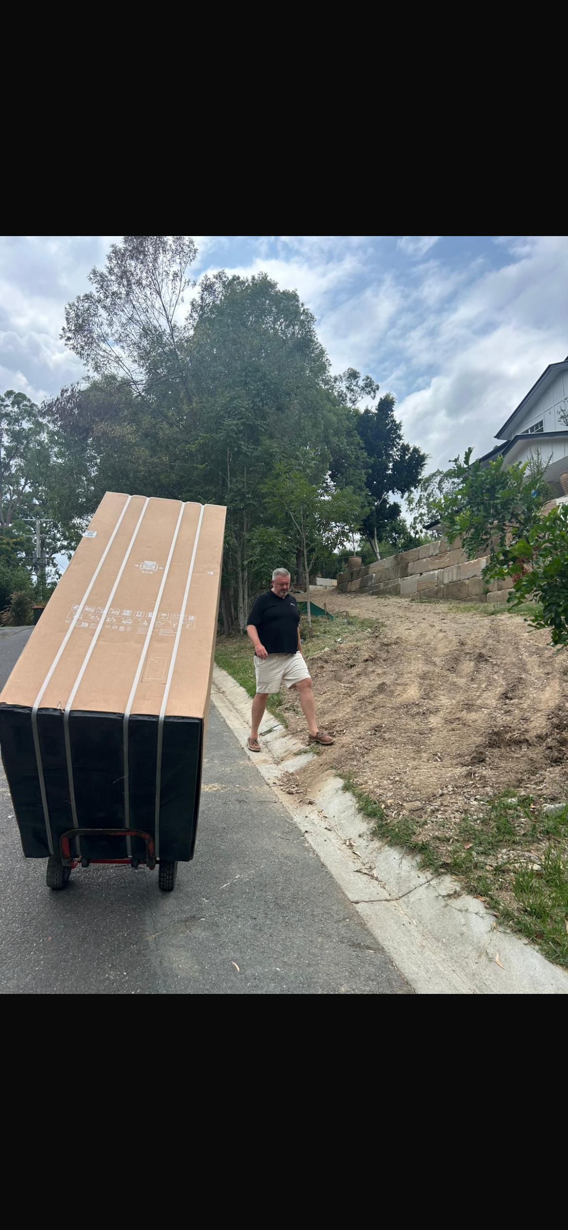 BMS driver with furniture on trolley